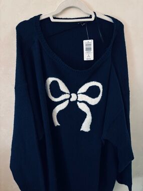 Torrid Navy Boatneck Vegan Cashmere Sweater with White Bow Graphic